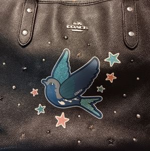 Coach Bag with bird embellishment and star studs